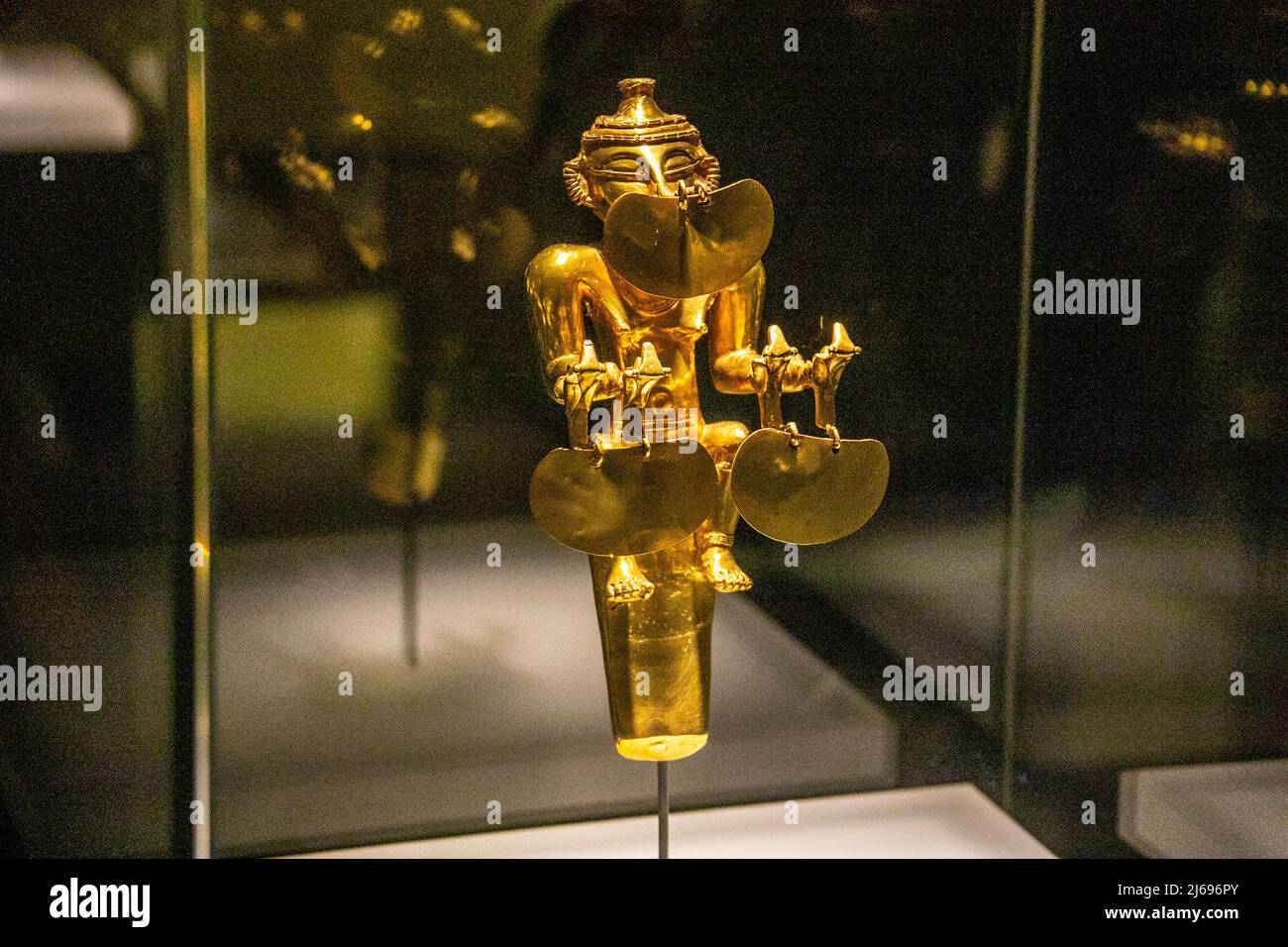 Gold Lime container in the form of a Female chieftan, Museo del Oro, Bogotá, Colombia, Museo del Oro, Bogotá, Colombia Stock Photo