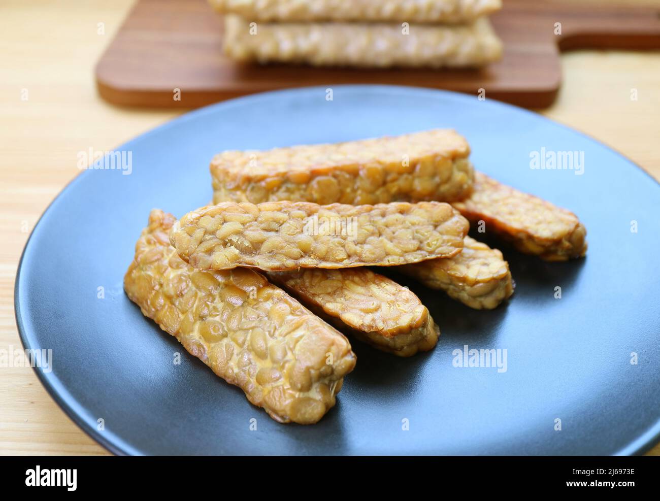 Plate of pan fried Tempeh, a high plantbased protein source for whole