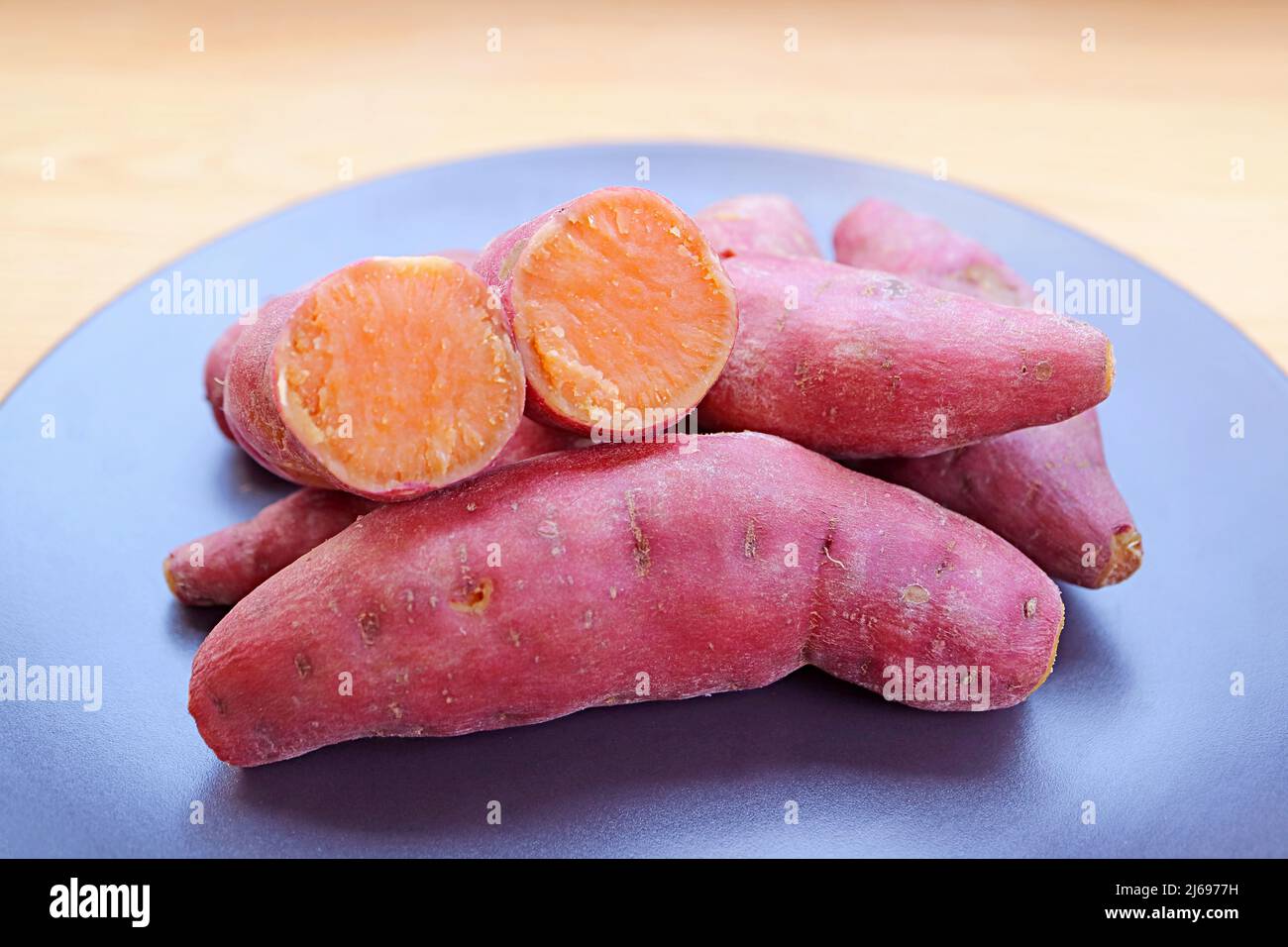 Plate of Tasty Boiled Sweet Potatoes for a Concept of Whole Foods Plant-based Diet Stock Photo
