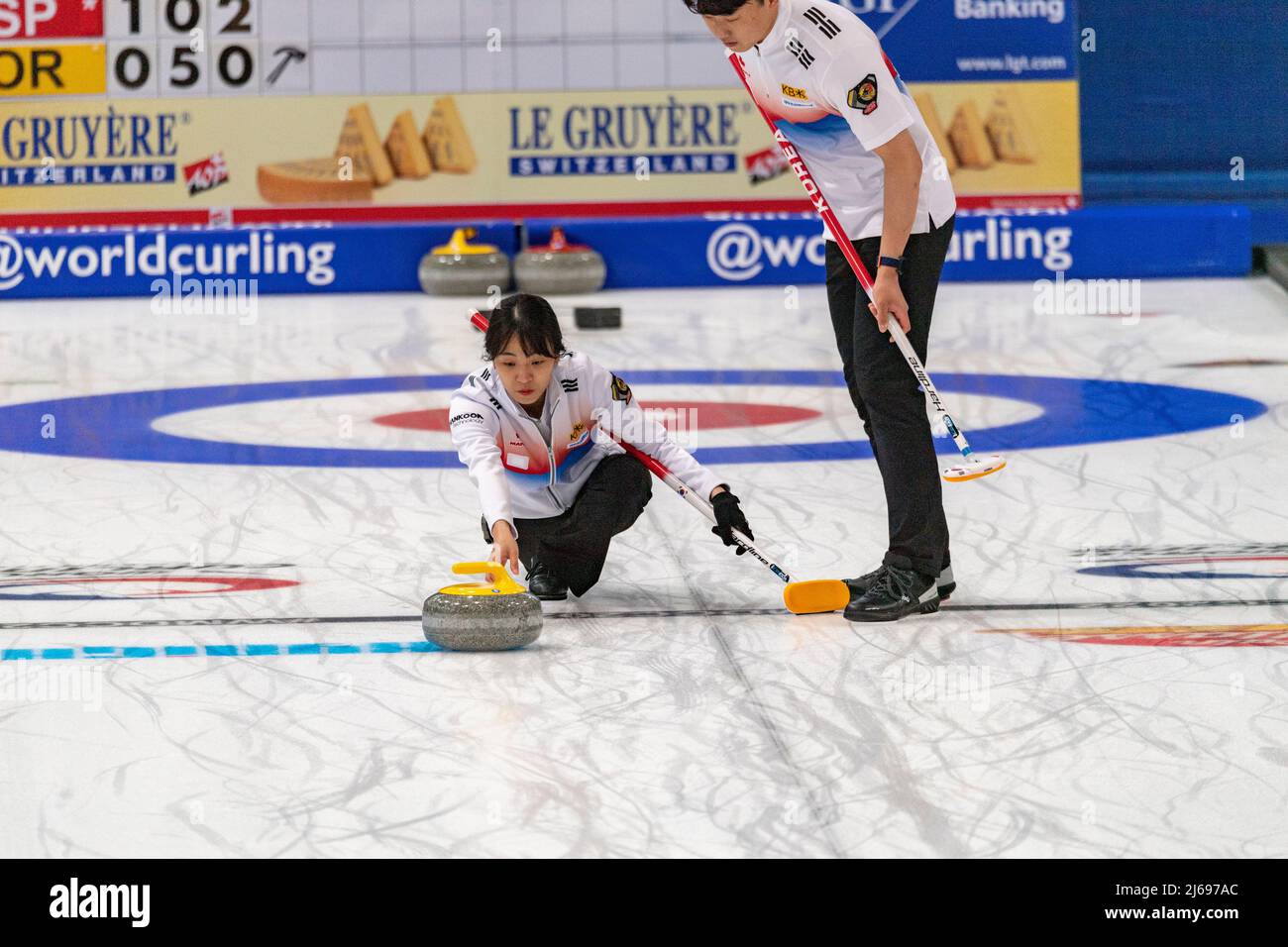 Mixed doubles curling hi-res stock photography and images