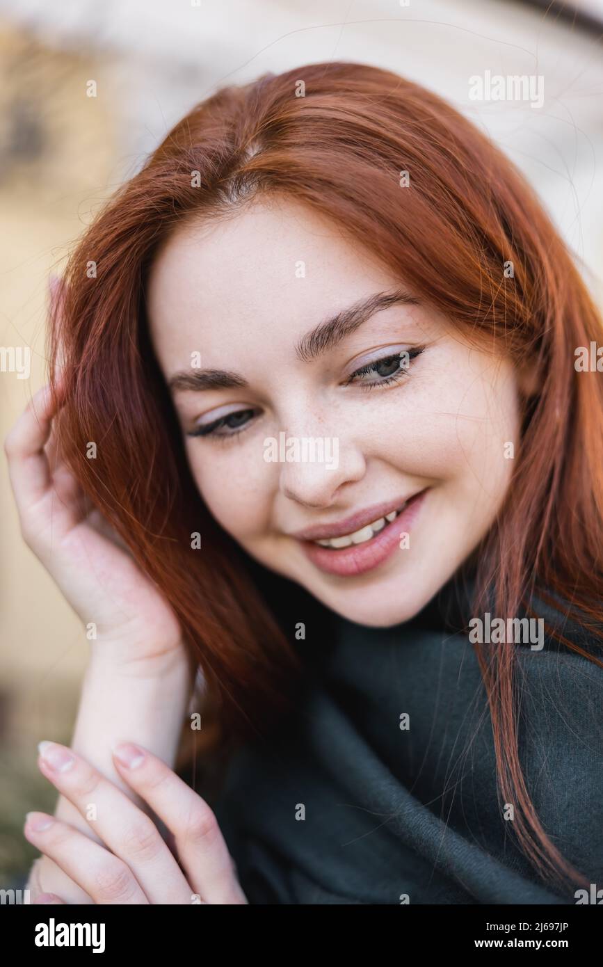 Redhead woman looking down hi-res stock photography and images - Alamy