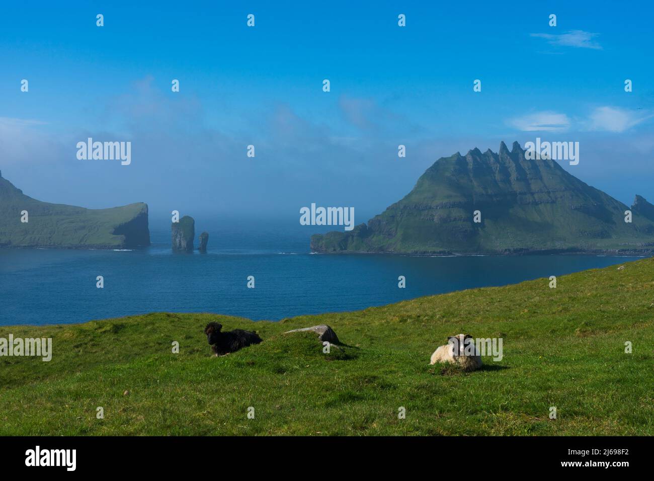 View of Tindholmur Island from Vagar Island, Faroe Islands, Denmark Stock Photo