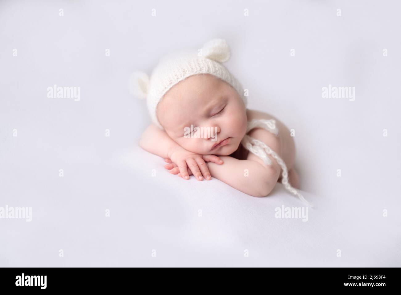 Baby sleeping on front hi-res stock photography and images - Alamy