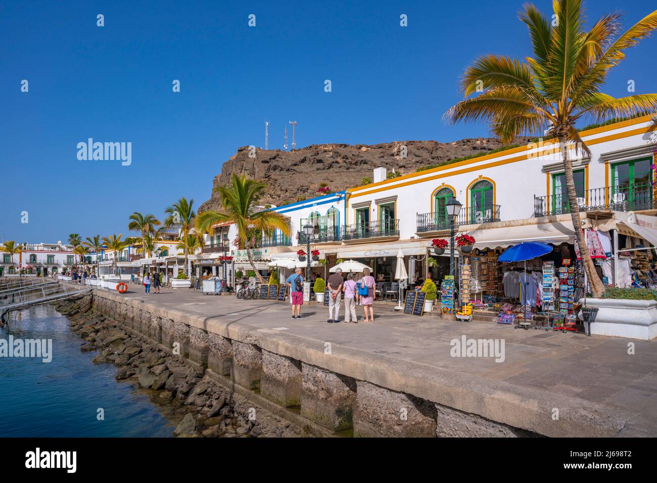 View of harbour and colourful buildings along the promenade in the old town, Puerto de Mogan, Gran Canaria, Canary Islands, Spain, Atlantic, Europe Stock Photo