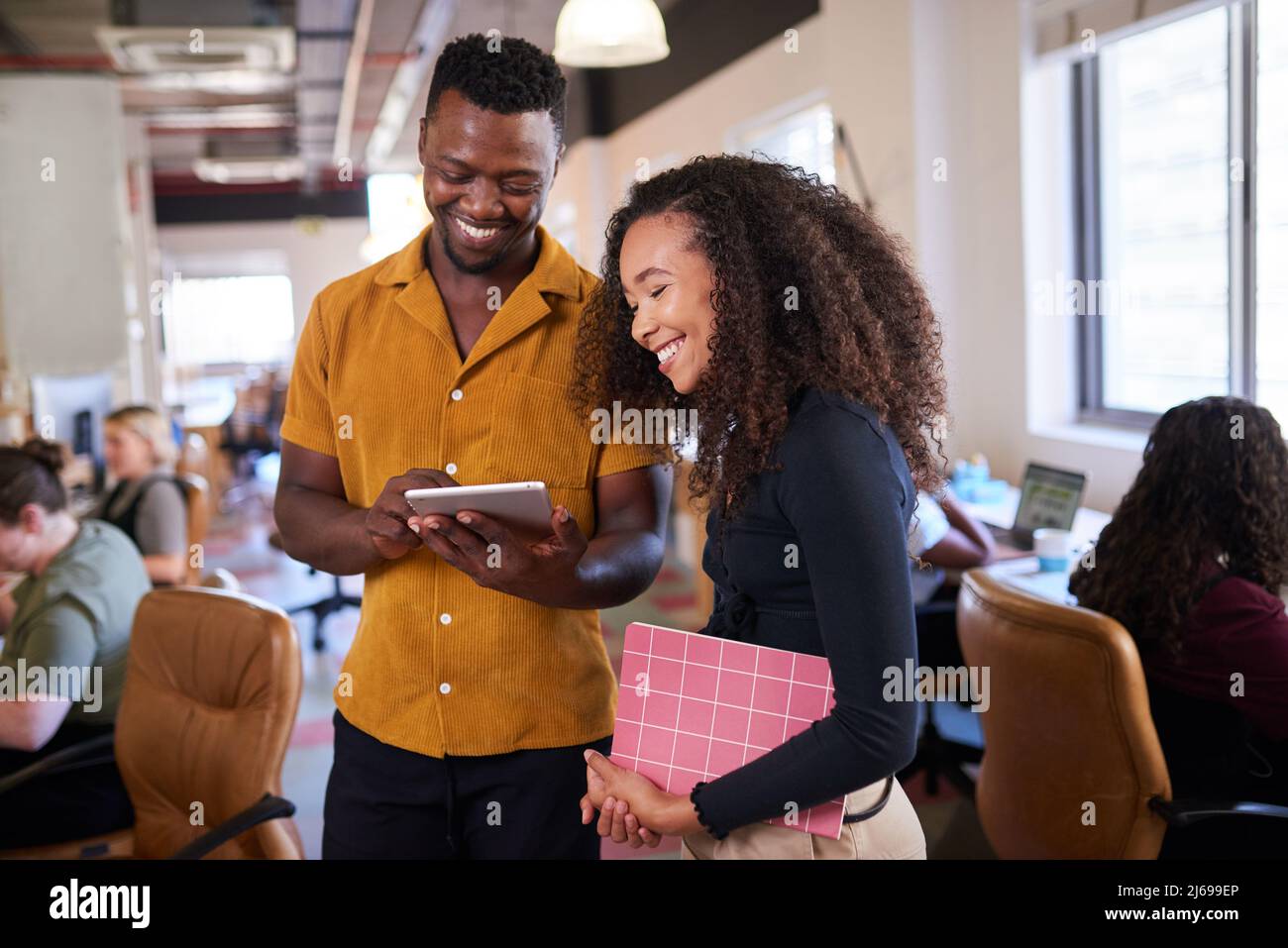 Happy creative diverse colleagues hi-res stock photography and images ...