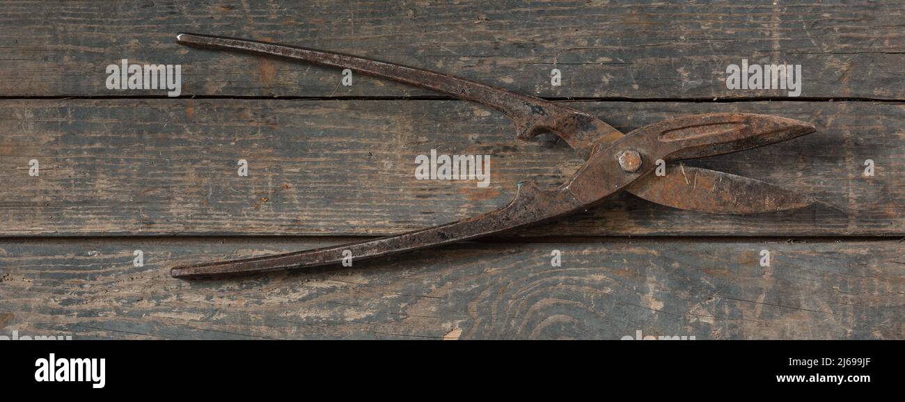 Vintage Metal Cutting Scissors On Wooden Stock Photo