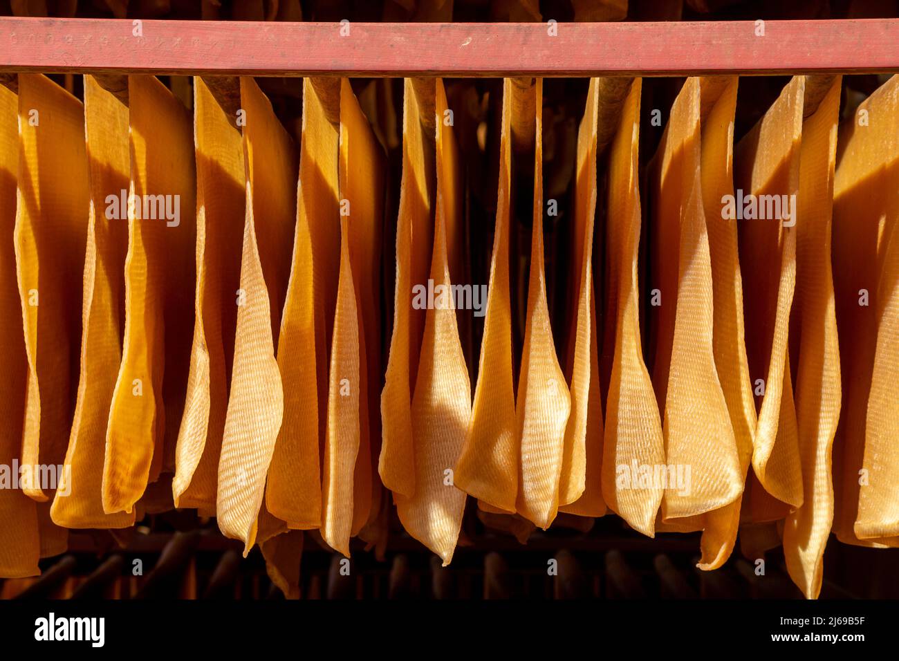 Process of rubber sheets production by drying and fumigation. High quality fumigate rubber