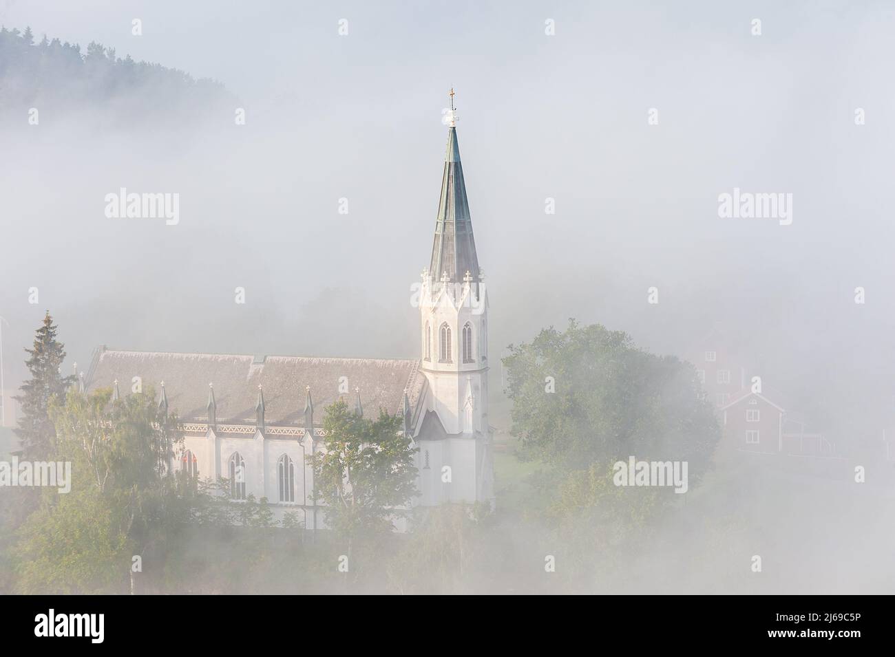Church in the mist, Sweden. Stock Photo