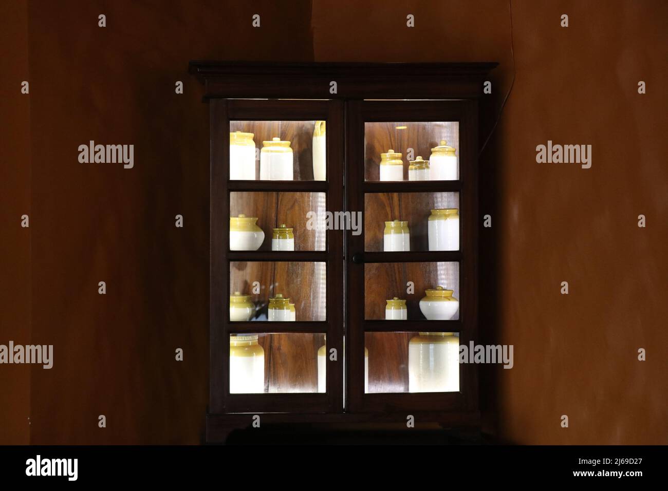 Showcase full of ceramic pickle jars, Different types of vegetable pickles kept for showcasing in a special type of jar called as bharni Stock Photo