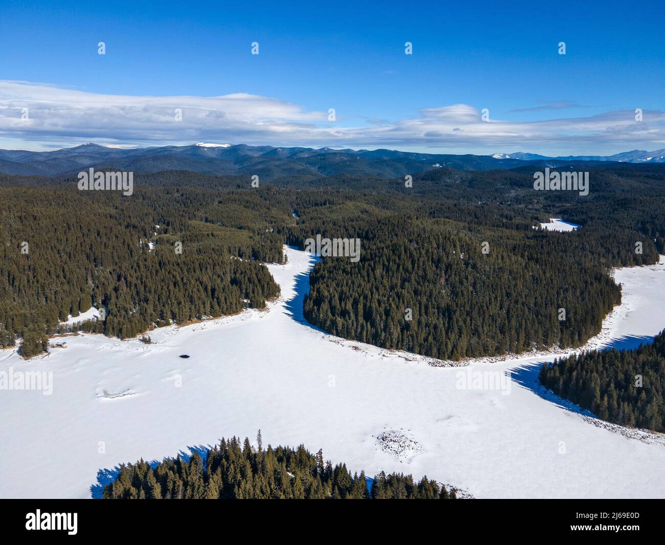 aerial-winter-view-of-shiroka-polyana-wide-meadow-reservoir-covered