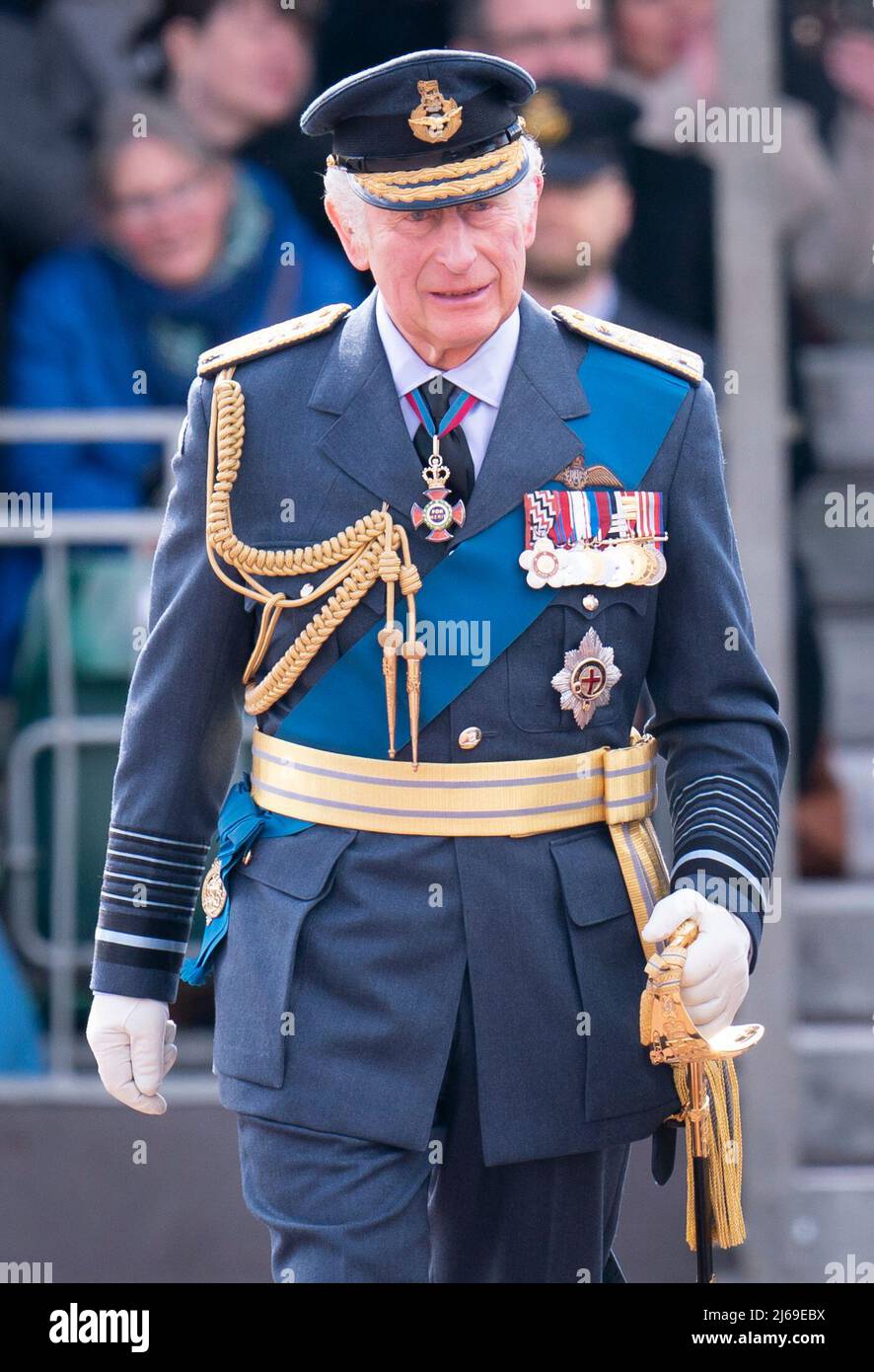 The Prince of Wales, Marshal of the Royal Air Force, attends a parade at RAFC, Cranwell, Sleaford, in Lincolnshire, held for officers and aviators who graduated from RAF Cranwell and RAF Halton during the Covid pandemic without any guests in attendance. Picture date: Friday April 29, 2022. Stock Photo