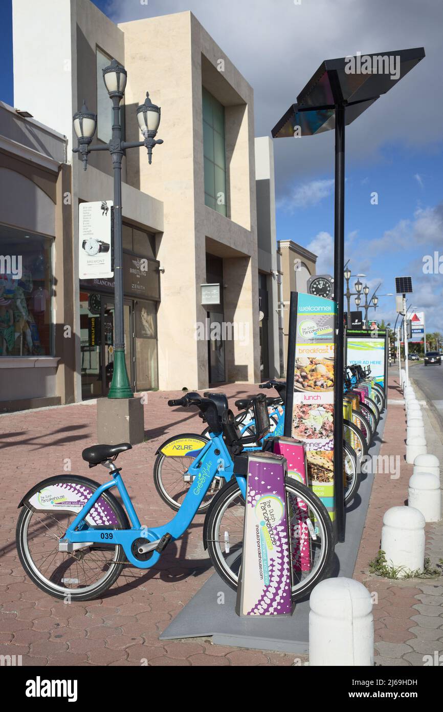 ORANJESTAD, ARUBA DECEMBER 14, 2020 Green Bike Rental Station along Lloyd G. Smith Blvd near