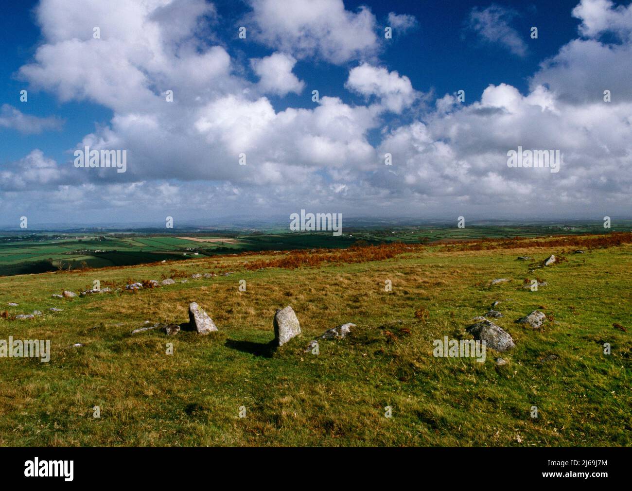 View SE of the two stone gateposts & low collapsed drystone walls of a Bronze Age field on East Moor, Bodmin Moor, Cornwall, England, UK. Stock Photo