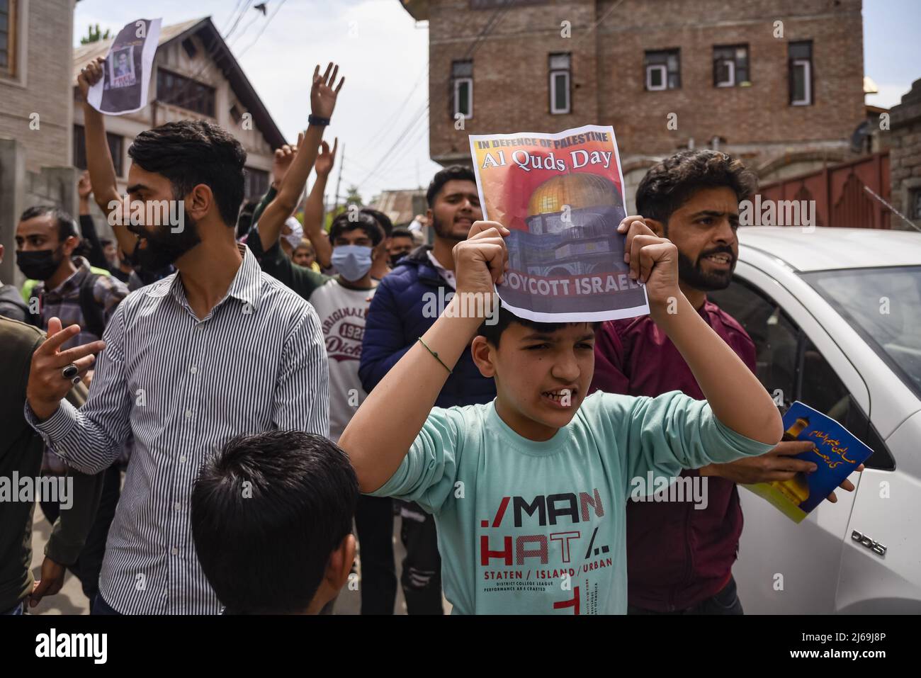 Kashmir, India. 29th Apr, 2022. A Kashmiri Muslim boy holds a placard ...