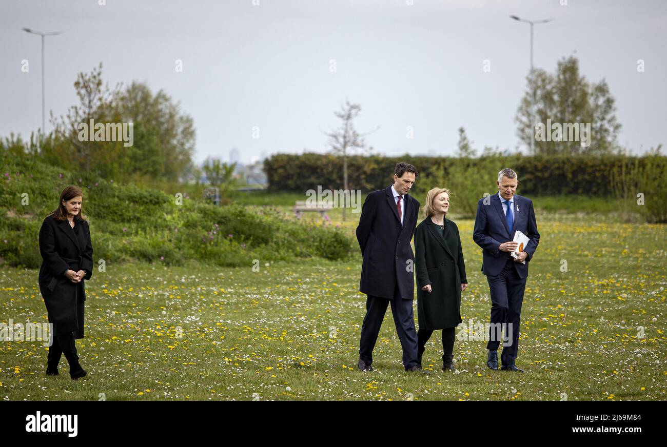 Vijfhuizen, Netherlands. 29th Apr, 2022. 2022-04-29 15:47:44 VIJFHUIZEN - Minister Wopke Hoekstra (Foreign Affairs) and his British colleague Liz Truss are laying flowers at the MH17 monument. Truss was in the Netherlands to speak with Hoekstra about holding perpetrators of war crimes in Ukraine responsible. ANP RAMON VAN FLYMEN netherlands out - belgium out Credit: ANP/Alamy Live News Stock Photo