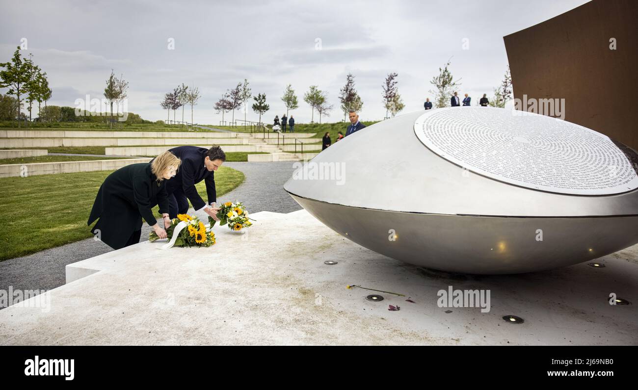Vijfhuizen, Netherlands. 29th Apr, 2022. 2022-04-29 15:38:01 VIJFHUIZEN - Minister Wopke Hoekstra (Foreign Affairs) and his British colleague Liz Truss are laying flowers at the MH17 monument. Truss was in the Netherlands to speak with Hoekstra about holding perpetrators of war crimes in Ukraine responsible. ANP RAMON VAN FLYMEN netherlands out - belgium out Credit: ANP/Alamy Live News Stock Photo