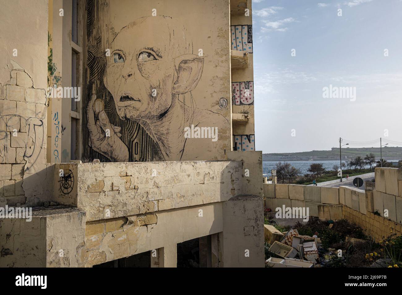 Mural depicting the character Gollum from the film Lord of the Rings on a wall of the abandoned Jerma Palace Hotel, Marsaskala, Malta Stock Photo