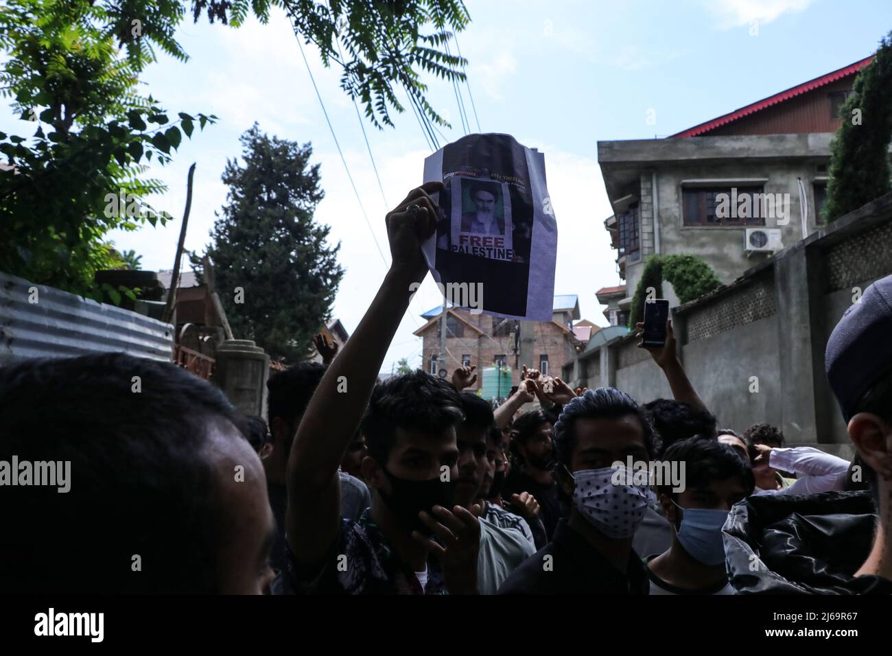 Kashmir, India. 29th Apr, 2022. A Kashmiri Muslim holds a poster ...