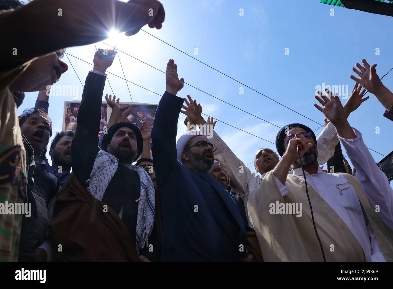 Kashmir, India. 29th Apr, 2022. Kashmiri Muslims march during a rally ...
