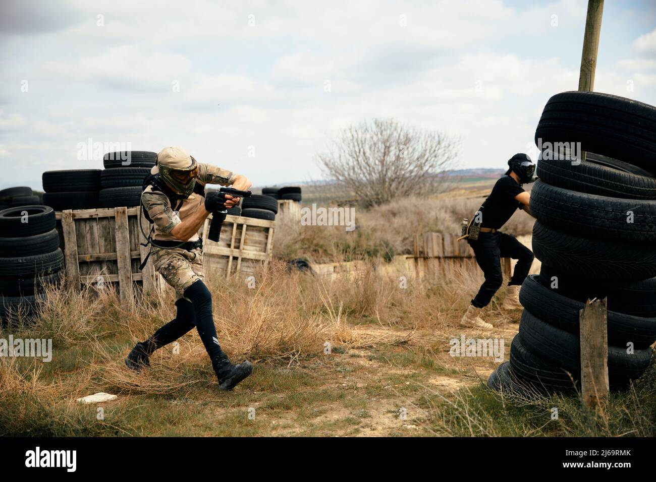 Soldiers carefully advancing position in the middle of an airsoft game