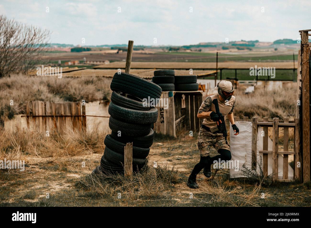 Soldier carefully advancing position in the middle of an airsoft game
