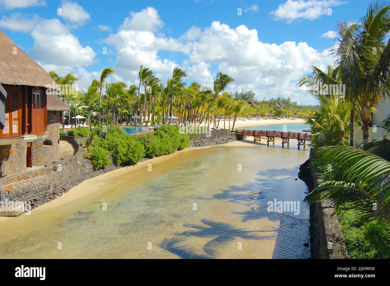 a small bridge over a river in a hotel in Mauritius Stock Photo