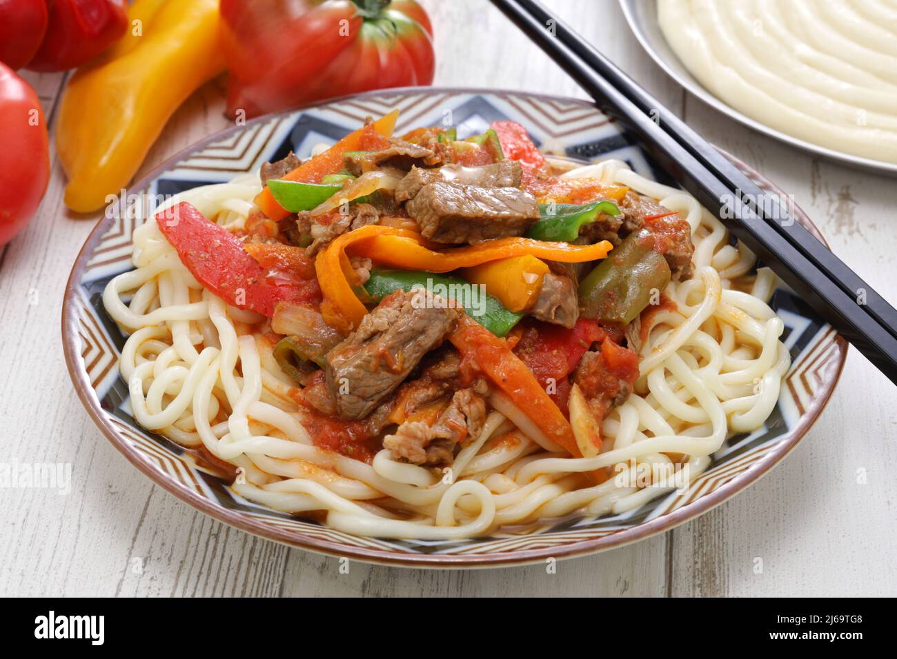 Laghman, hand pulled noodles dish with lamb meat and vegetables, Uyghur