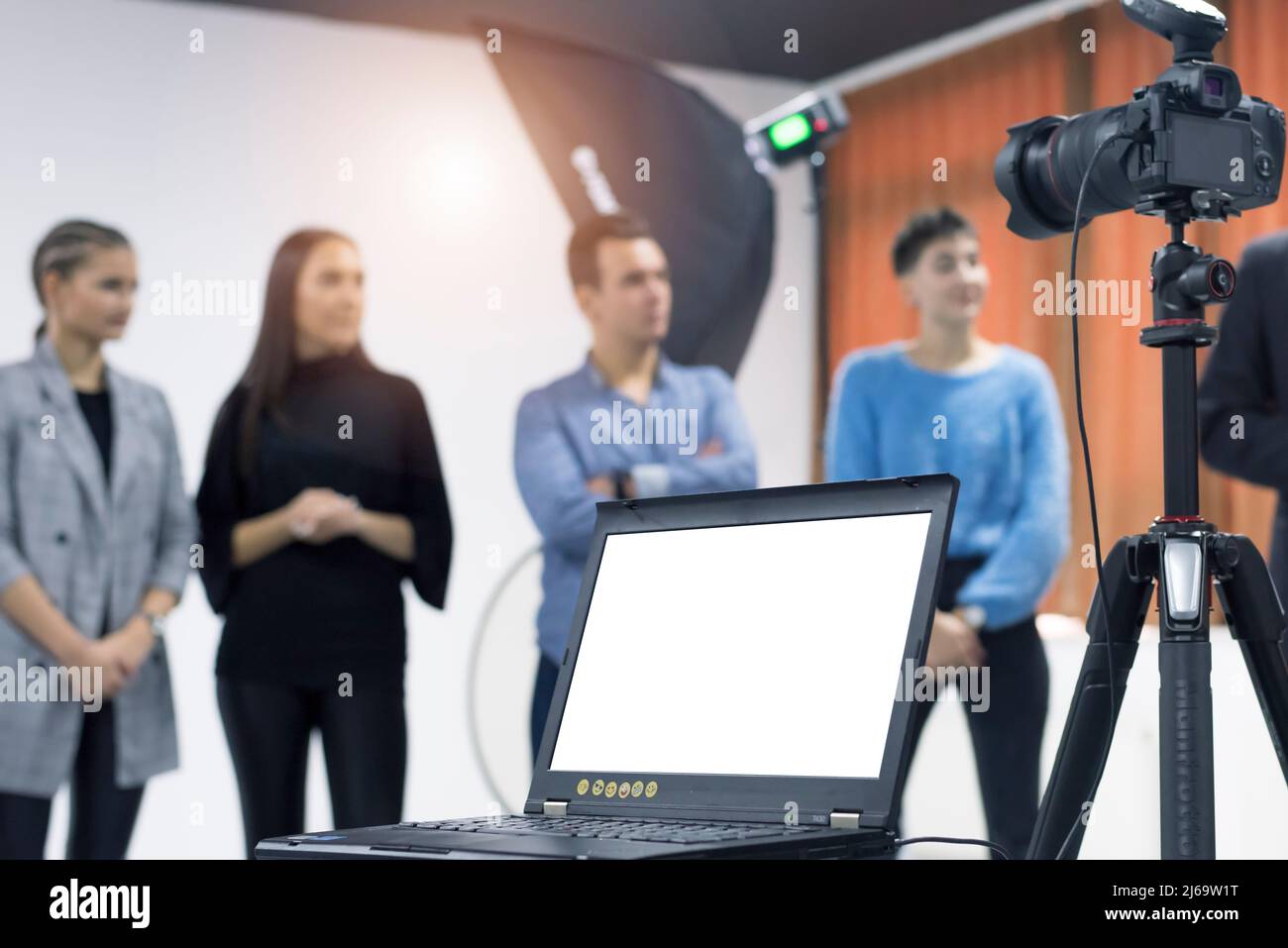 Students with video camera in computer lab, Filming in a Studio