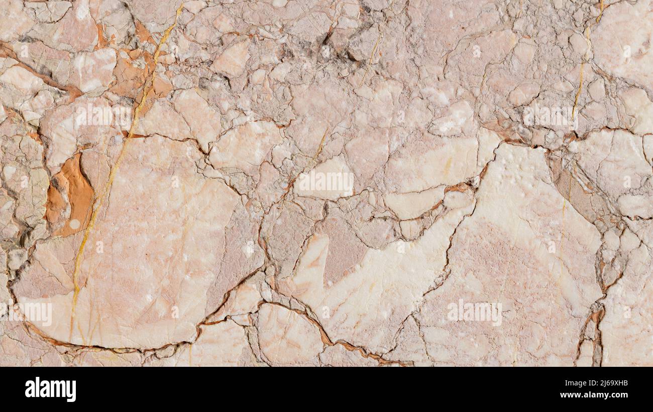 Cracked antique marble texture. Weathercracked stone wall. Marble