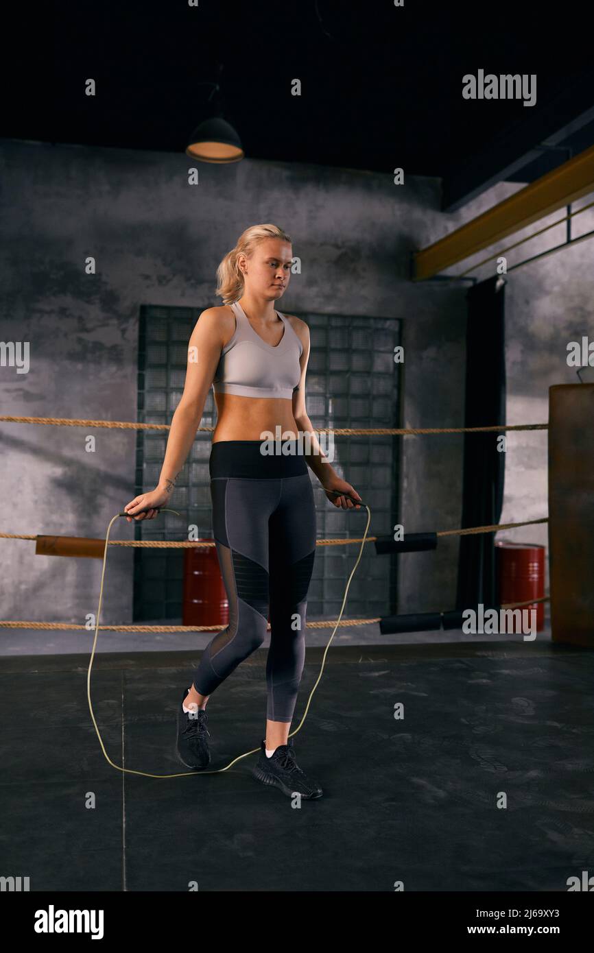 Woman boxer jumping on skipping hi-res stock photography and images - Alamy