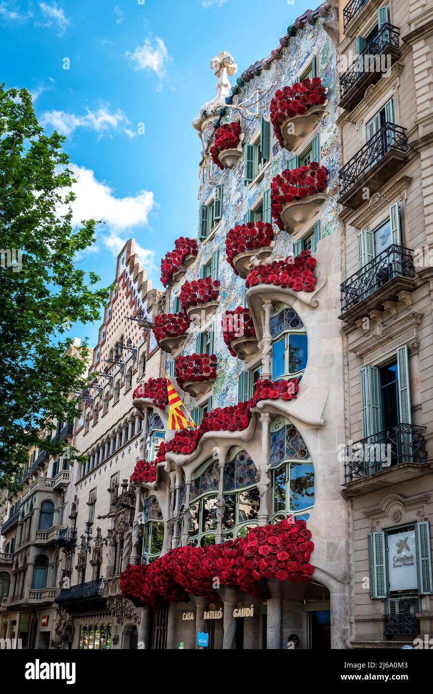 Barcelona, Spain. April 23, 2022. Famous Batllo House during Sant Jordi day  in Barcelona with roses decoration. Batllo House is designed by famous arc  Stock Photo - Alamy