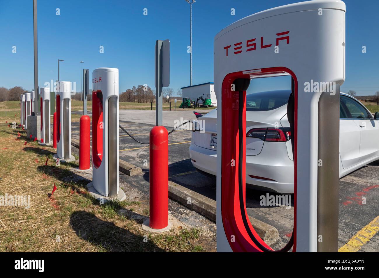 Beaver Dam, Kentucky - A car charges at a Tesla charging station in a rest area on the Western Kentucky Parkway. Stock Photo