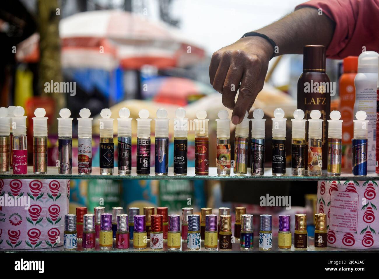 Assam, India. 29th Apr, 2022. Vendor selling Attar Perfume ahead of  Eid-ul-Fitr at a street market in Guwahati, Assam, India on 29 April 2022.  Eid-Ul-Fitr marks the end of the holy month