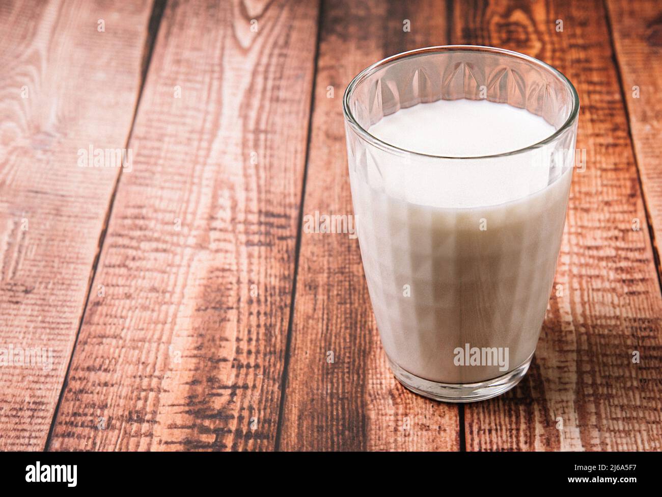 Fresh milk on a wooden background, breakfast, stock photo Stock Photo