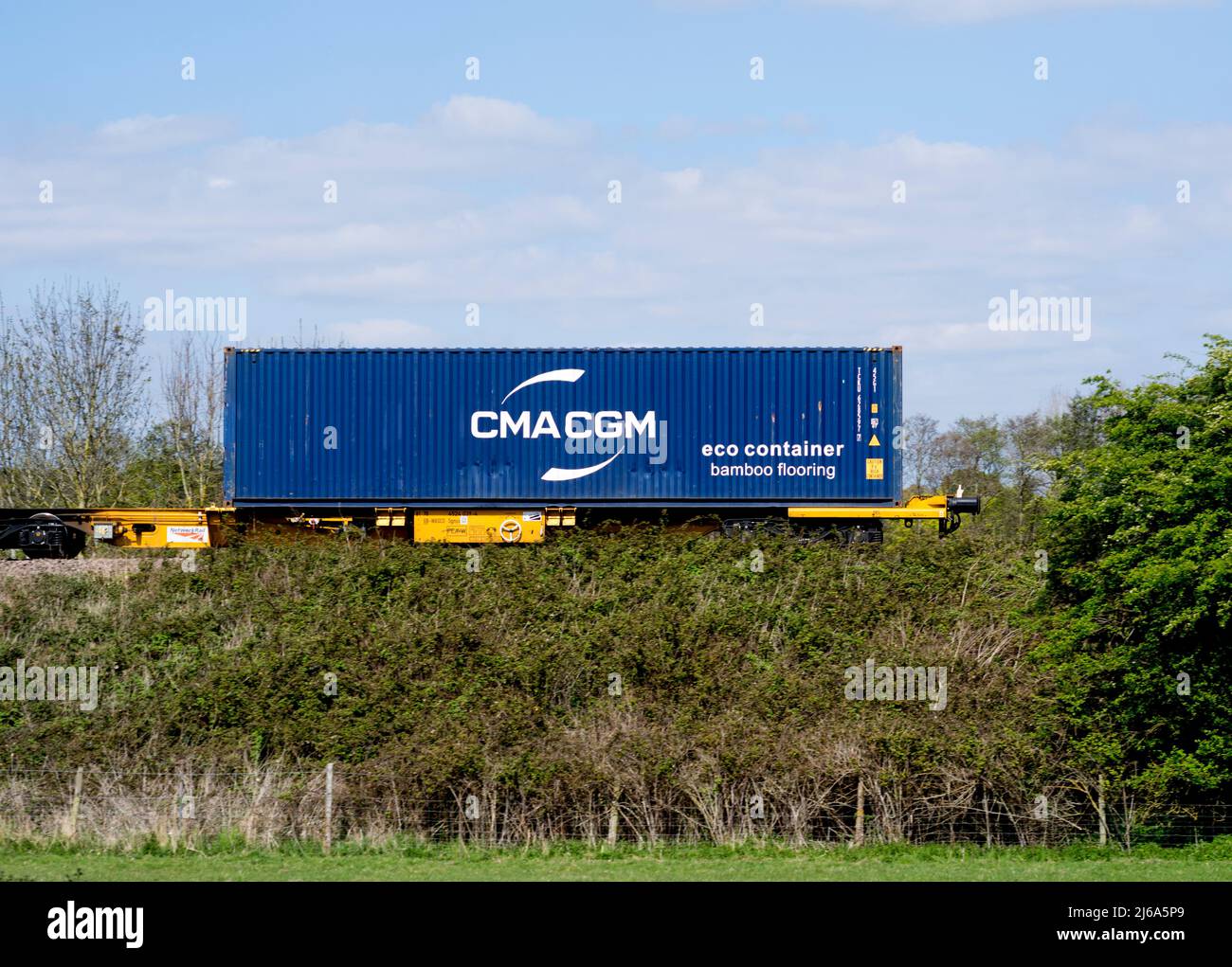 CMA CGM eco container with bamboo flooring, on a freightliner train, Warwickshire, UK Stock Photo