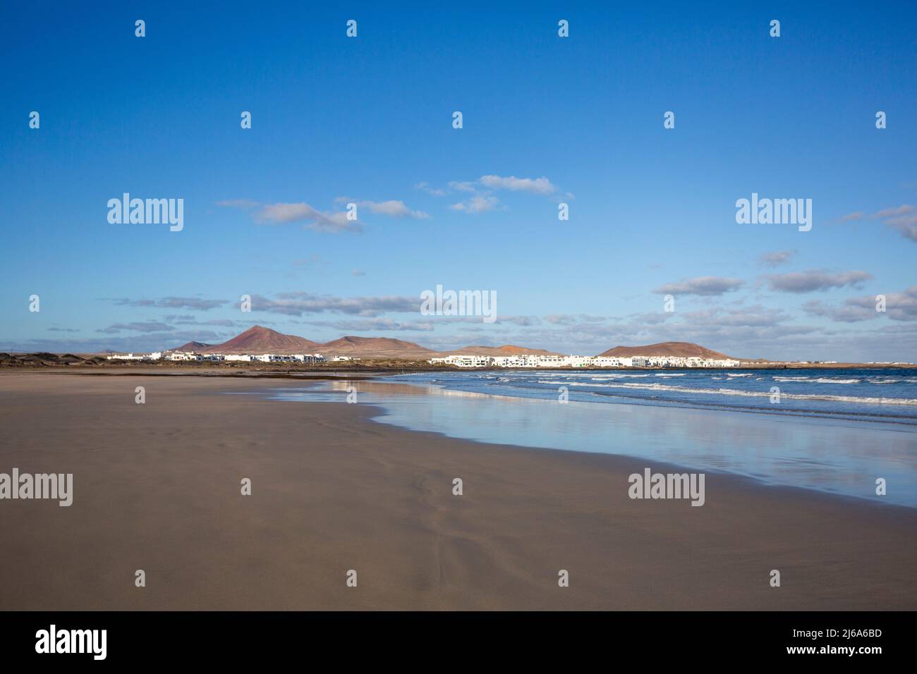 Famara beach and El Jable desert at sunrise, Spain Stock Photo