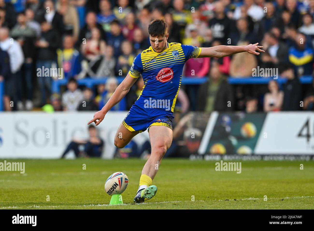 Riley Dean #27 of Warrington Wolves converts his try Stock Photo - Alamy