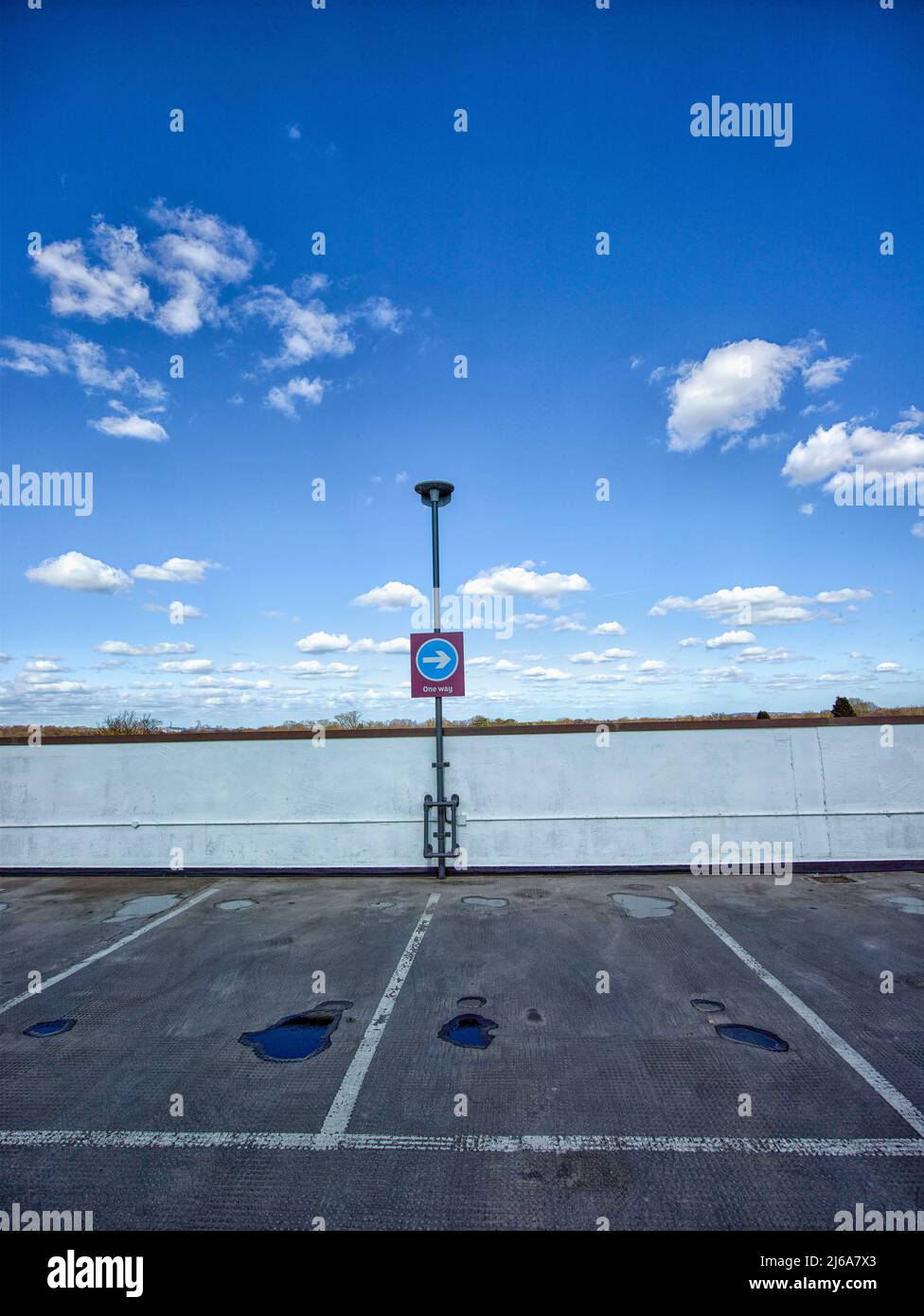 Cars parking lot against sky hi-res stock photography and images - Alamy
