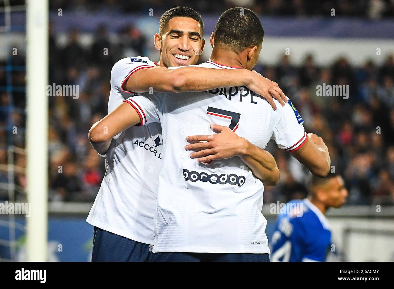 Strasbourg, France. 29th Apr, 2022. Achraf HAKIMI of PSG celebrate his goal  with Kylian MBAPPE of PSG during the French championship Ligue 1 football  match between RC Strasbourg and Paris Saint-Germain on