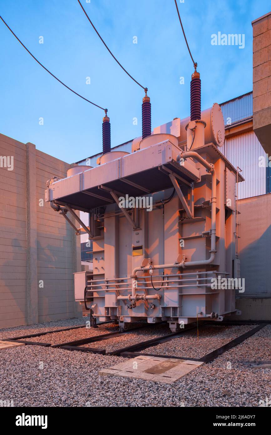 Power Transformer in High Voltage Electrical Outdoor Substation Stock Photo