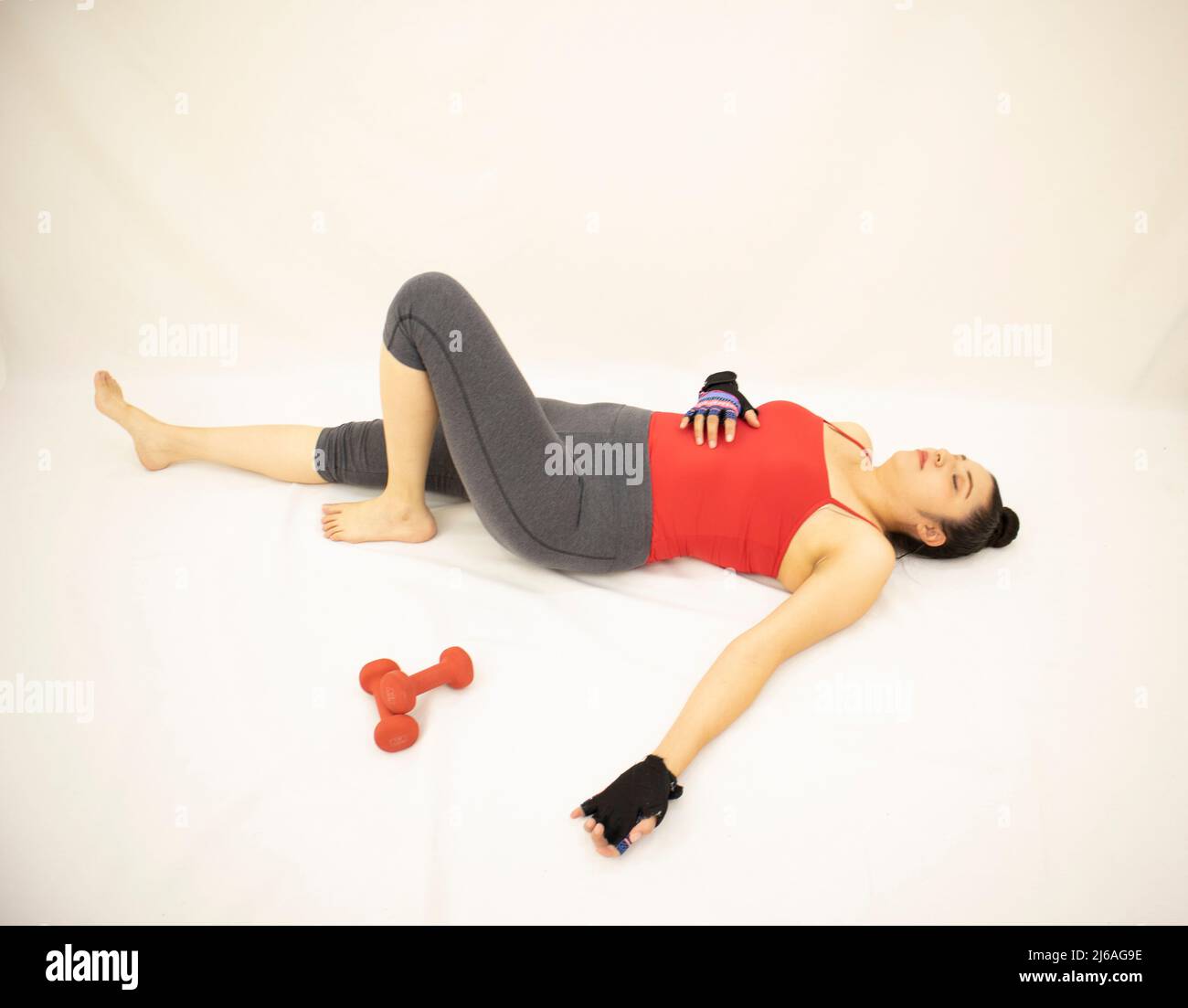 Fit Young Lady Lying on Mat with Roll on Breast during Workout Stock Image  - Image of brunette, fitness: 253445325