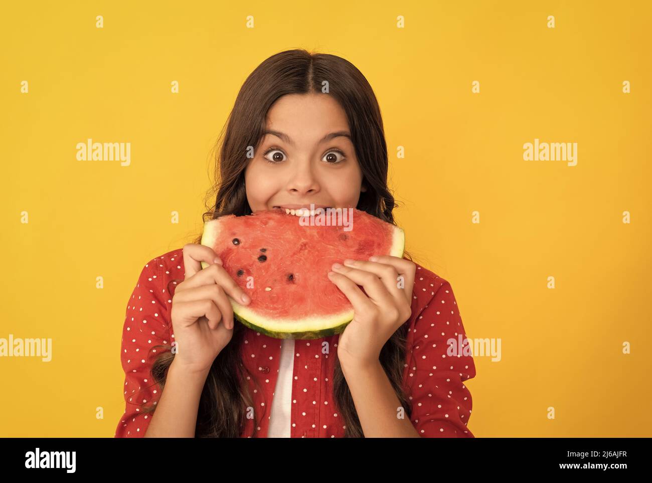 hungry kid with fruit. healthy food for children. fructose healthy