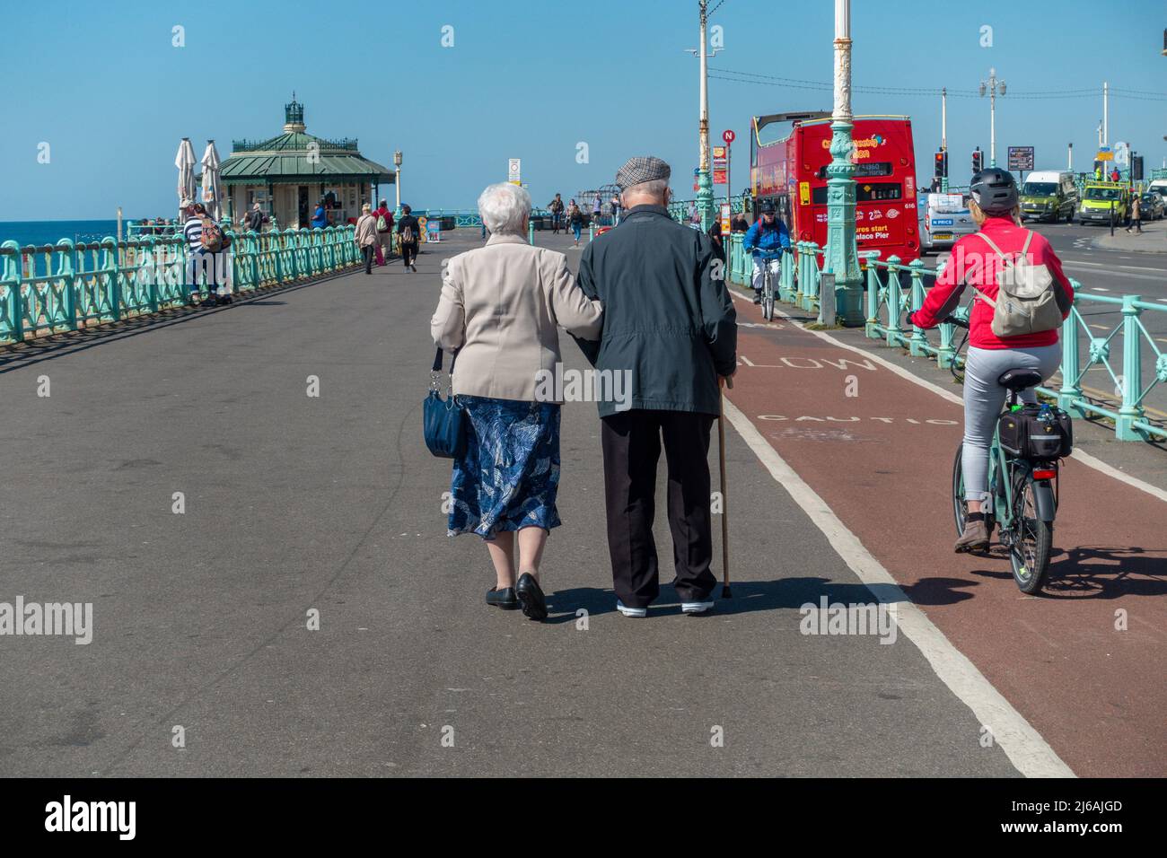 Old age Pensioners,Couple,Strolling,Brighton Seafront,Sunshine,Blue Sky,Brighton,sussex,england Stock Photo
