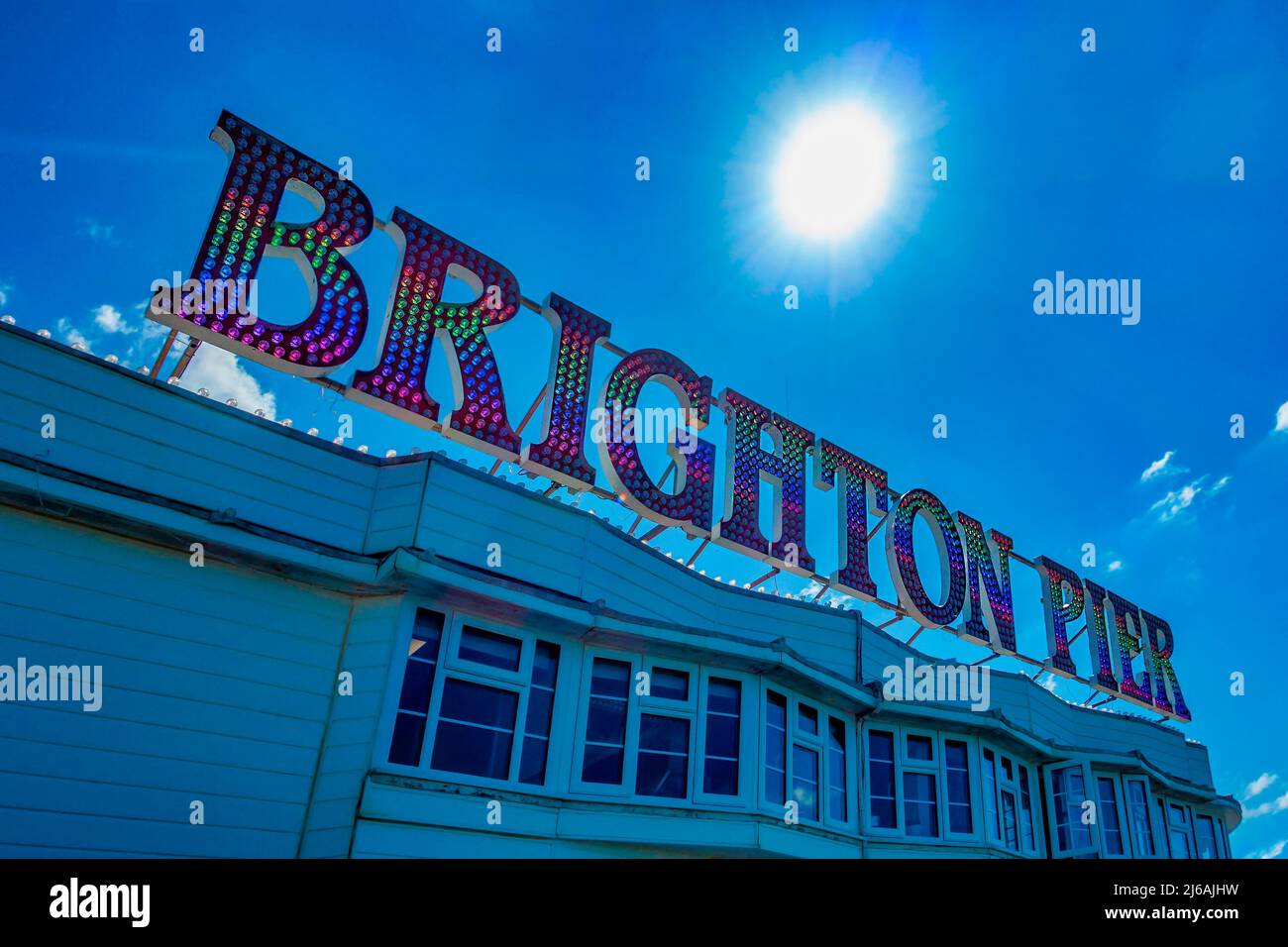 Brighton Pier,Illuminated,Sign,Blue Sky,Brighton,East Sussex,England Stock Photo