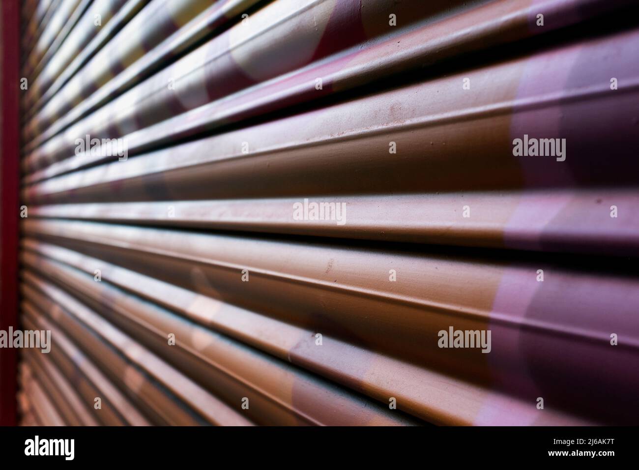 Dramatic Angle View of Roll-down Security Door, Madrid, Spain Stock Photo
