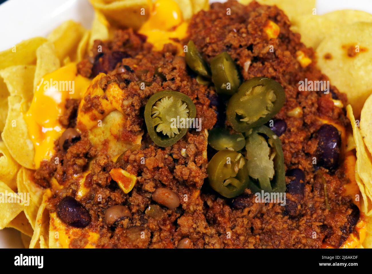 corn tortilla chips with spicy beef chili con carne Stock Photo