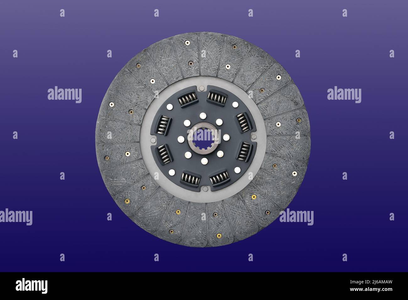 Clutch disc, car clutch disc, car transmission, blue background, close