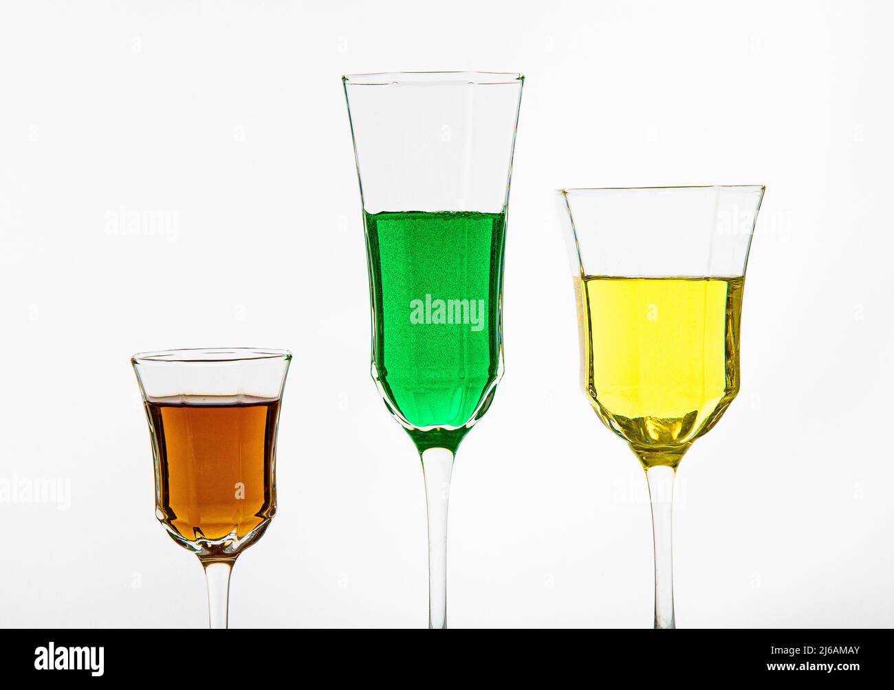 Alcohol glasses, with strong coloured vodka, decoration for bars and
