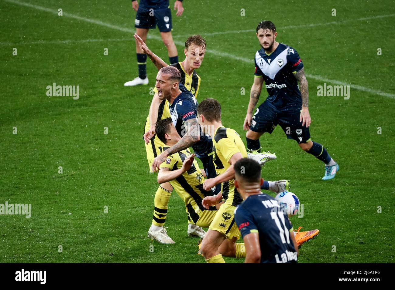 Melbourne, Australia, 29 April, 2022. Jason Davidson of Melbourne Victory falls during the A-League soccer match between Melbourne Victory and Wellington Phoenix at AAMI Park on April 29, 2022 in Melbourne, Australia. Credit: Dave Hewison/Speed Media/Alamy Live News Stock Photo