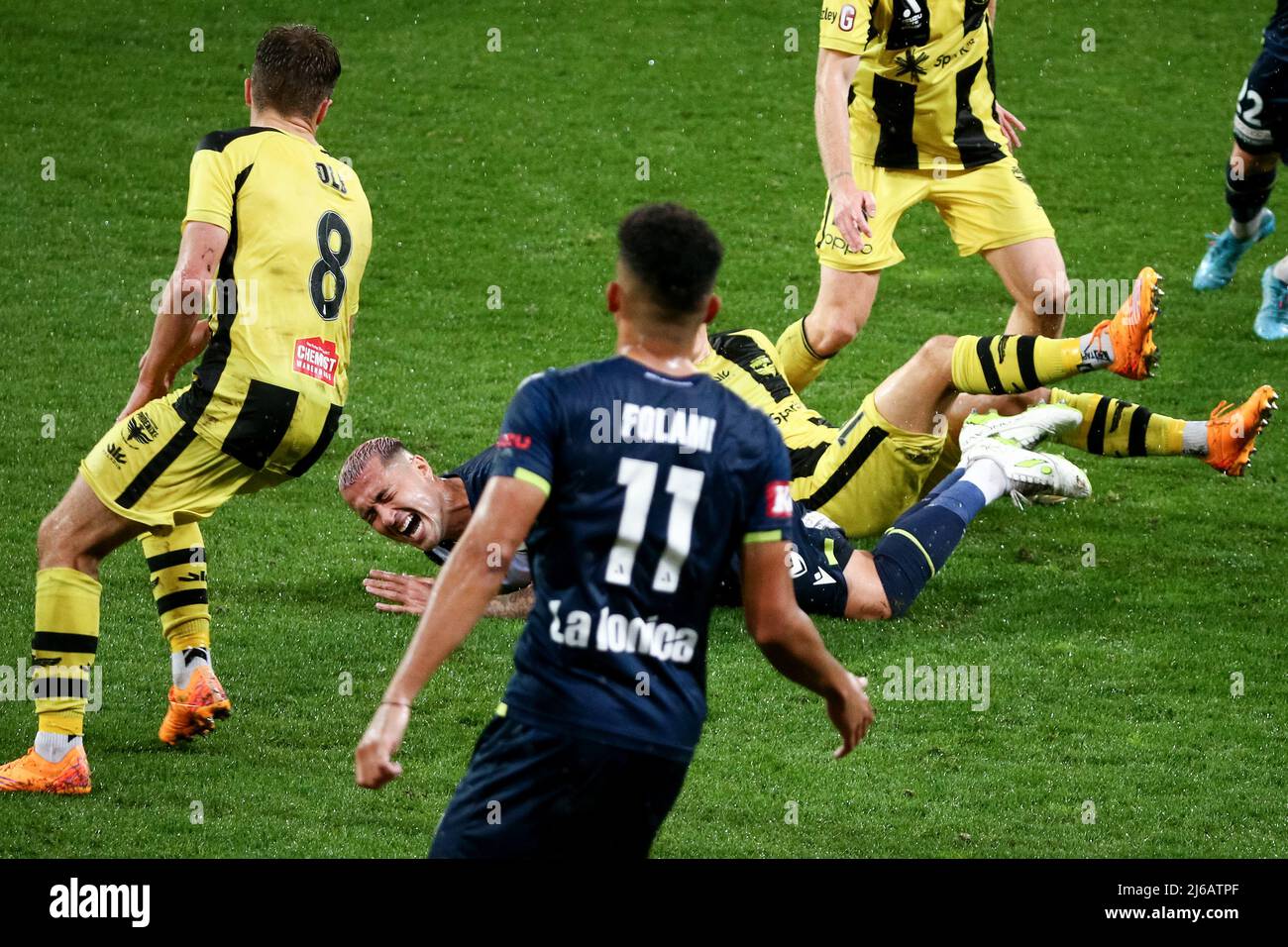 Melbourne, Australia, 29 April, 2022. Jason Davidson of Melbourne Victory falls during the A-League soccer match between Melbourne Victory and Wellington Phoenix at AAMI Park on April 29, 2022 in Melbourne, Australia. Credit: Dave Hewison/Speed Media/Alamy Live News Stock Photo